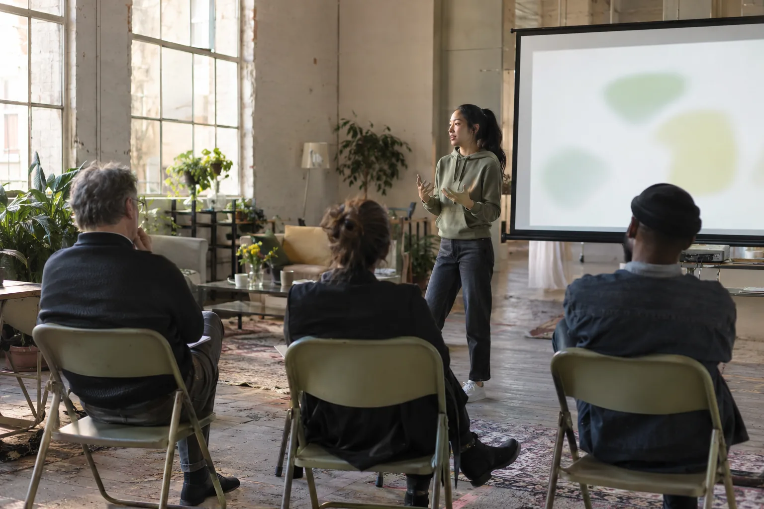 A founder rehearsing a demo day pitch in front of mentors