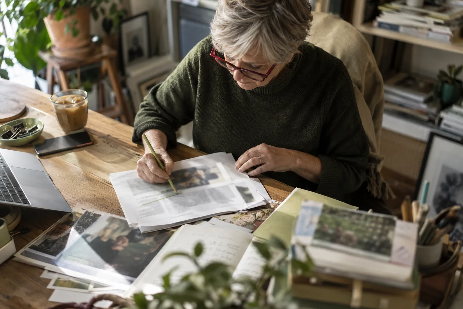 An editor crossing out a headline on a printed draft